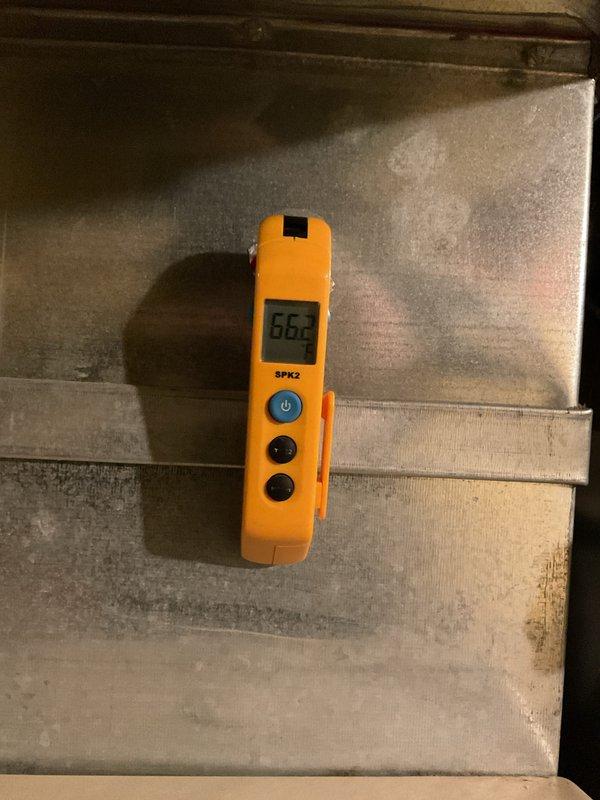 Completed annual air conditioning maintenance on a 5-year-old system. Performed comprehensive inspection of HVAC equipment including furnace/air handler unit, verified proper operation of all components, checked refrigerant levels and system temperatures with digital measurement tools recording 66.3°F readings, inspected condensate drainage system and PVC piping connections, examined exhaust venting and flue assembly for proper sealing, and confirmed all safety controls and shutoff valves were functioning correctly. System operating within normal parameters with no issues identified.