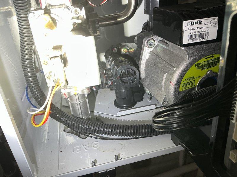 Performed descaling maintenance service on Navien NPE-240A2H tankless water heater. Accessed internal components, flushed heat exchanger and associated piping assembly to remove mineral buildup and scale deposits. Verified proper operation of circulation pump and mechanical components upon completion. Unit restored to optimal performance specifications.