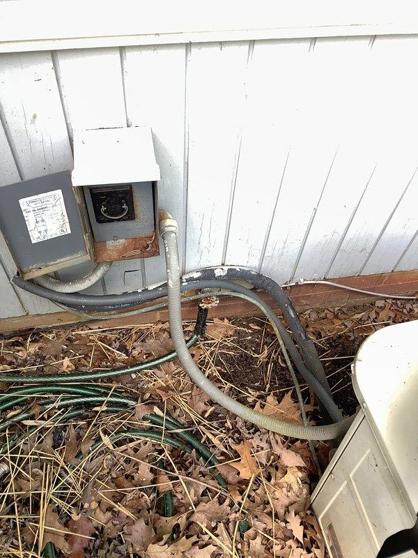 Conducted on-site assessment for HVAC system replacement, documenting existing electrical infrastructure including main breaker panel configuration and exterior electrical disconnect box. Photographed current equipment locations and electrical connections to prepare comprehensive replacement estimate for new air conditioning system installation.