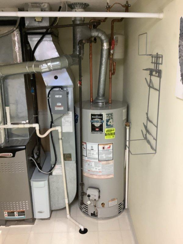 Completed installation of new Lennox HVAC system including furnace and air conditioning unit, along with 40-gallon tall water heater in utility closet. Mounted outdoor A/C condenser on heat pump legs for proper elevation and drainage. Connected all ductwork, refrigerant lines, condensate drainage, and electrical components per manufacturer specifications. Verified proper airflow, tested all safety controls, and ensured both heating/cooling system and water heater are fully operational.