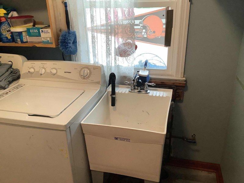 Responded to waterline slab leak in 60-year-old residential property. Conducted thorough inspection of laundry room area and surrounding spaces to assess leak location and extent of damage. Documented conditions and provided detailed estimate for slab leak repair options, including potential access points and necessary excavation or re-routing requirements given the age of the existing plumbing system.