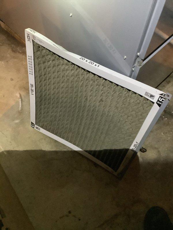 Responded to no cooling complaint on residential air conditioning system. Upon arrival, confirmed unit was running but not producing cold air. Performed system diagnostics and identified failed contactor preventing compressor from engaging. Replaced defective contactor and verified proper operation of compressor and condenser fan. Inspected air filter and found it heavily soiled, restricting airflow. Installed new 20x20x1 pleated filter to restore proper system airflow. Additionally, installed new thermostat per customer request using customer-supplied equipment. Tested all system functions including cooling cycle, fan operation, and thermostat controls. System now operating properly with adequate cooling capacity and airflow.