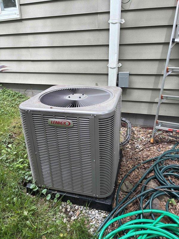 Completed routine HVAC maintenance visit for cooling system on residential Lennox outdoor condensing unit. Inspected exterior condenser unit, confirmed operational status with no visible damage or deterioration, and replaced heavily soiled air filter that had accumulated significant dust and debris buildup across pleated media, restoring proper airflow and system efficiency.