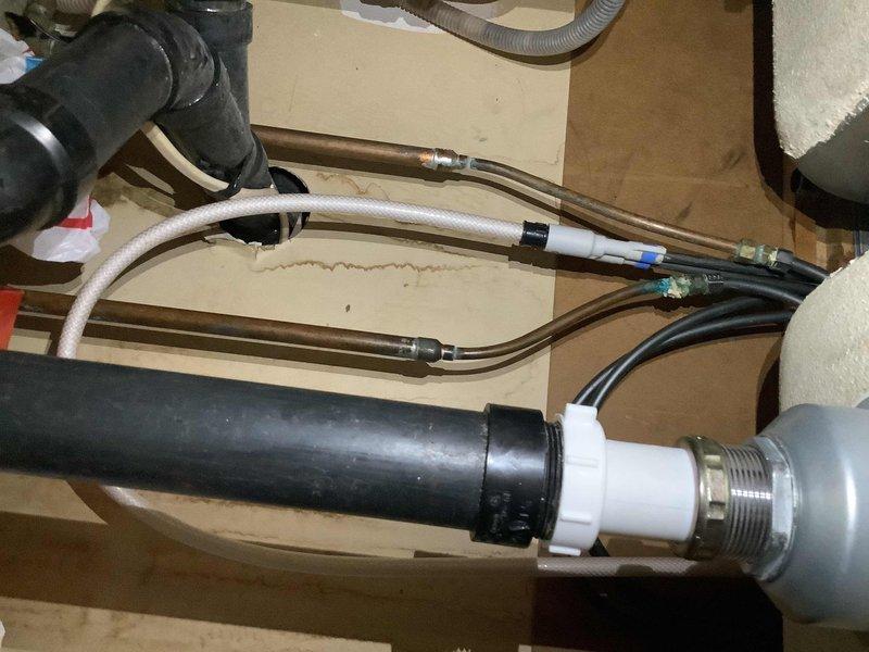 Responded to service call at 1980s-era residence for multiple plumbing issues. Diagnosed and repaired broken water supply connection below kitchen sink that was actively leaking into cabinet, preventing further water damage. Addressed non-functioning toilet by inspecting flush mechanism and water supply line; restored proper flushing operation. Replaced worn plumbing components and fittings as needed to ensure proper function of both fixtures.