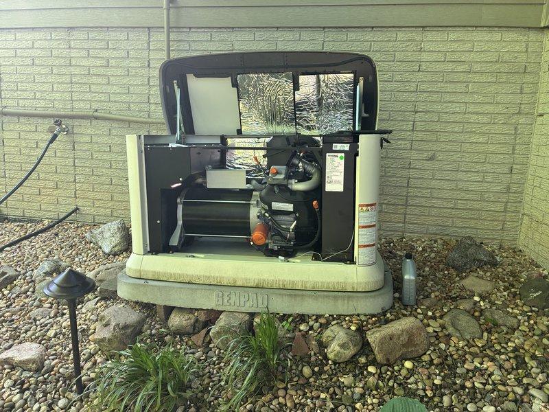 Performed scheduled maintenance service on a 3-year-old 22kW Generac residential standby generator. Conducted comprehensive inspection of unit including engine components, battery system, fuel delivery system, and electrical connections. Verified proper operation of control panel with green indicator light functioning correctly, confirming system readiness and normal operating status.