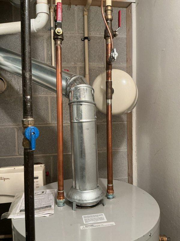 Completed flush and fill maintenance procedure on HydroJet residential tanked water heater. Drained sediment buildup from tank bottom, flushed system with fresh water supply, and refilled unit to restore optimal operating efficiency and extend equipment lifespan.