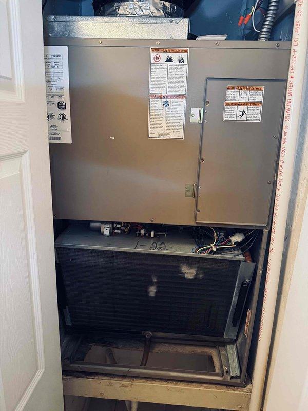 Performed annual maintenance on an 18-year-old residential air conditioning system. Inspected evaporator coil and air handler unit, noting dust and dirt accumulation on aluminum fins. Verified electrical connections, capacitors, and control modules; confirmed proper operation of all components and documented system condition with photographs.