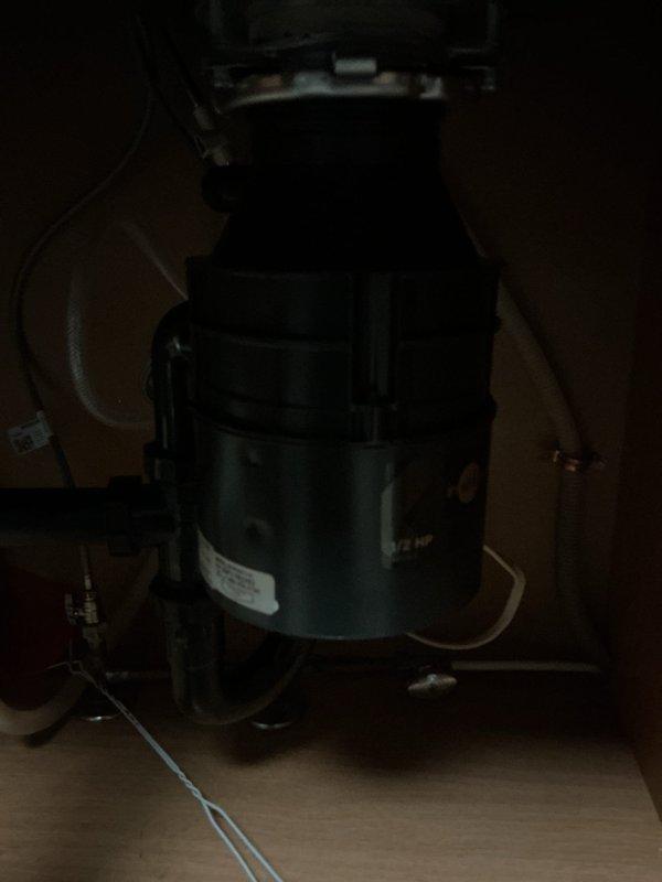 Installed a Camerist chrome kitchen faucet with spray attachment model 7840, including new supply lines. Replaced a pair of 1/2" x 3/8" straight shutoff valves to ensure proper water control. Removed existing unit and installed a new 1/2 HP garbage disposal under the kitchen sink. All components were tested for proper operation and verified leak-free connections upon completion.