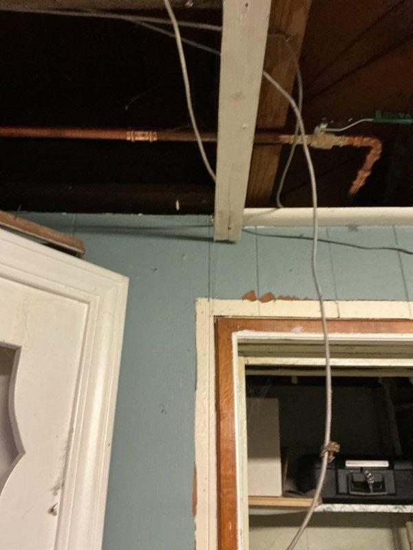 Replaced exterior sillcock with new Woodford frost-free hose bib. Accessed plumbing lines through ceiling panel near driveway area to complete installation. Parts were ordered and received prior to completing the repair, ensuring proper freeze-proof protection for the exterior water connection.