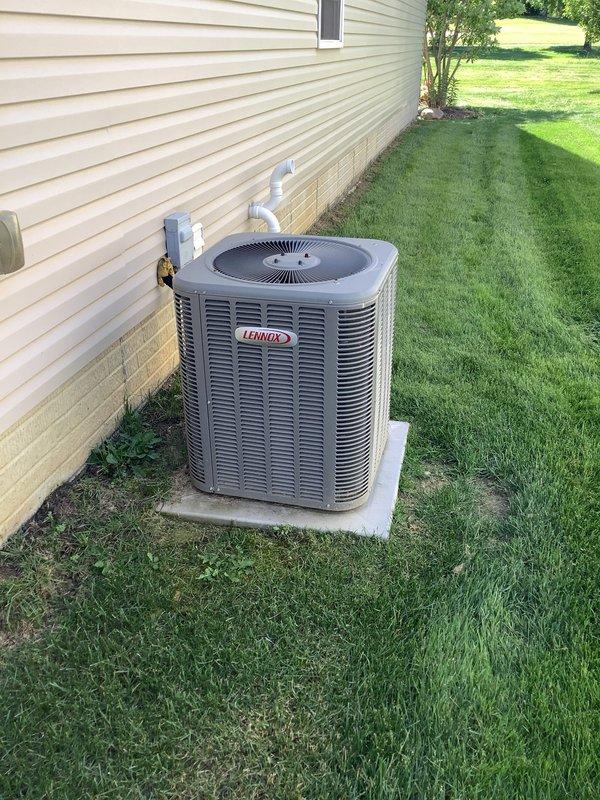 Completed semiannual air conditioning maintenance on 13-year-old Lennox condensing unit under active maintenance contract. Performed comprehensive system inspection including refrigerant level check, electrical connection testing, capacitor evaluation, contactor examination, condenser coil cleaning, and air filter assessment on indoor furnace unit. All components operating within manufacturer specifications with no deficiencies noted at time of service.