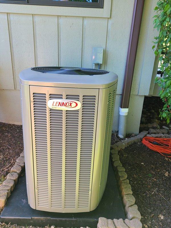 Completed full HVAC system installation including 80% efficiency furnace and air conditioning condenser unit. Installed Lennox brand outdoor AC condenser on concrete pad with proper clearances and drainage, connected refrigerant lines and electrical service, and installed condensate drain line. Fabricated and installed new vertical supply ductwork in basement with properly sealed joints and transitions to existing distribution system. System tested and verified operational with proper airflow and temperature differentials.