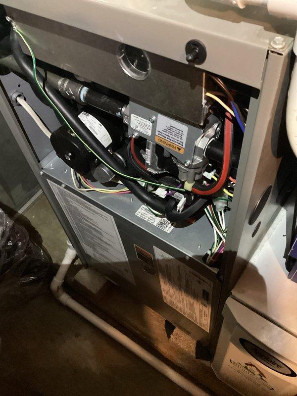 Completed annual air conditioning maintenance on a four-year-old HVAC system. Performed comprehensive tune-up including inspection of furnace interior components, electrical connections, control board operation, blower motor assembly, and air filtration system. Verified proper function of all safety controls, relay operations, and LED indicators on the control board. Customer renewed maintenance agreement at time of service.