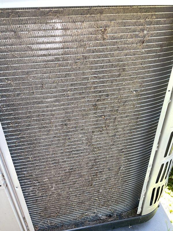 Completed comprehensive heating and cooling tune-up on residential HVAC system. Outdoor condenser coil exhibited heavy accumulation of dirt, dust, and debris throughout the fin surfaces, which was addressed during the maintenance service. Performed standard seasonal maintenance procedures to ensure optimal system performance and efficiency for both heating and cooling operations.
