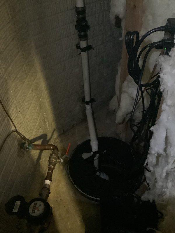 Installed battery backup system for existing sump pump installation in basement utility area. System required approximately four hours to complete, including pickup of pre-ordered parts and full installation of backup power components with associated plumbing connections and electrical integration to ensure continuous pump operation during power outages.