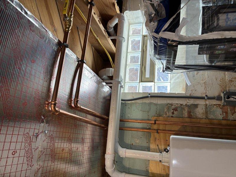 Responded to warranty call for GFCI breaker tripping on steam shower circuit. Inspected electrical panel and identified breaker repeatedly tripping, potentially related to recent plumbing work in the area. Evaluated circuit integrity, verified proper GFCI breaker operation, and documented panel configuration and basement utility room conditions where steam shower equipment is located.
