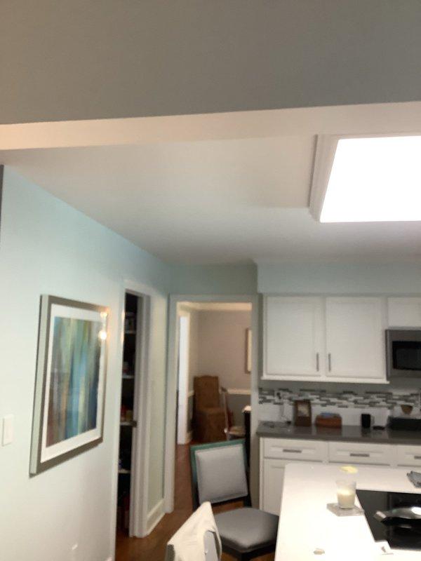 Responded to customer complaint of flickering lights in residential property. Upon inspection, identified loose wiring connections at dimmer switch controlling kitchen and dining area lighting. Tightened all wire connections at switch box, verified proper ground connection, and tested dimmer operation under load. Confirmed stable lighting operation across all affected fixtures with no flickering observed during multiple on/off cycles and dimming adjustments.
