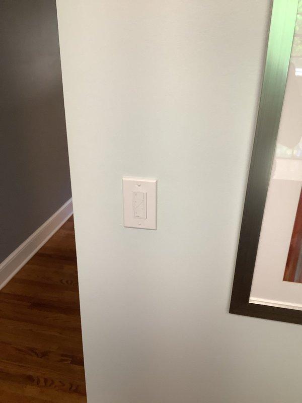 Responded to customer complaint of flickering lights in residential property. Upon inspection, identified loose wiring connections at dimmer switch controlling kitchen and dining area lighting. Tightened all wire connections at switch box, verified proper ground connection, and tested dimmer operation under load. Confirmed stable lighting operation across all affected fixtures with no flickering observed during multiple on/off cycles and dimming adjustments.