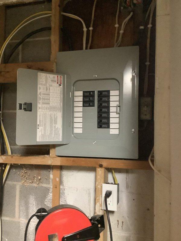 Returned to address failed electrical inspection. Reviewed inspector's requirements and completed necessary corrections to electrical panel installation in unfinished basement area. Work included verifying proper circuit breaker configuration, ensuring code-compliant conduit routing, and addressing deficiencies noted during initial inspection. Panel installation now meets county electrical code requirements and is ready for re-inspection.