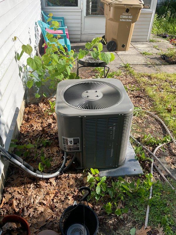 Performed coil cleaning service on residential Lennox outdoor condensing unit. Condenser coils were previously identified as dirty during tune-up inspection and required cleaning to restore proper heat transfer and system efficiency. Cleaned condenser coils, verified unit operation, and restored system to proper working condition.