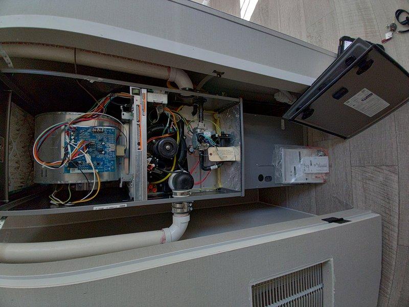 Converted brand new furnace from natural gas to propane operation. Replaced gas valve assembly with propane-compatible unit, adjusted orifices for proper fuel delivery, and reconfigured control board wiring connections. Verified all electrical connections, tested blower motor operation, and confirmed proper combustion and system functionality upon completion.