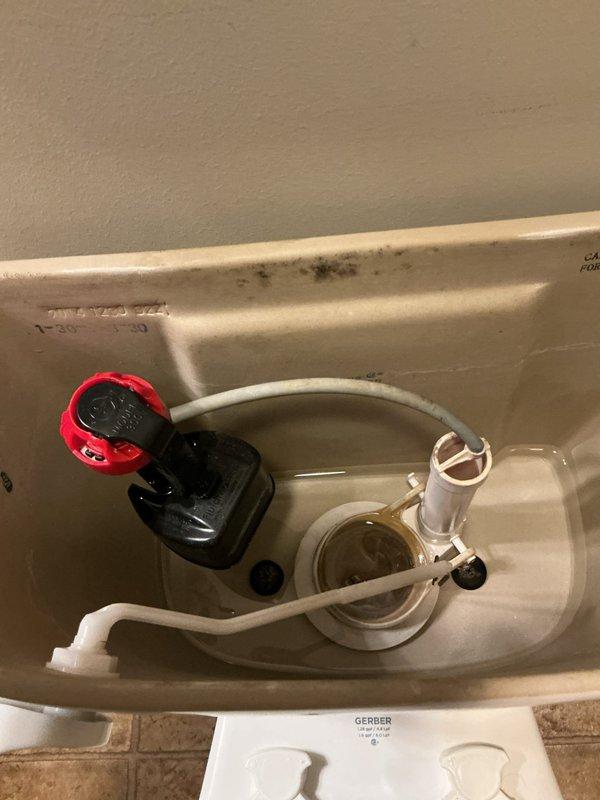 Responded to service call for Gerber toilet running continuously every few minutes. Upon inspection, removed tank lid and diagnosed faulty flush valve assembly with deteriorated flapper causing improper seal and continuous water flow into bowl. Replaced complete flush valve mechanism including flapper and overflow tube. Adjusted fill valve water level to manufacturer specifications. Tested flush cycle multiple times to verify proper operation and confirm no continuous running. System now functioning correctly with no leaks detected.