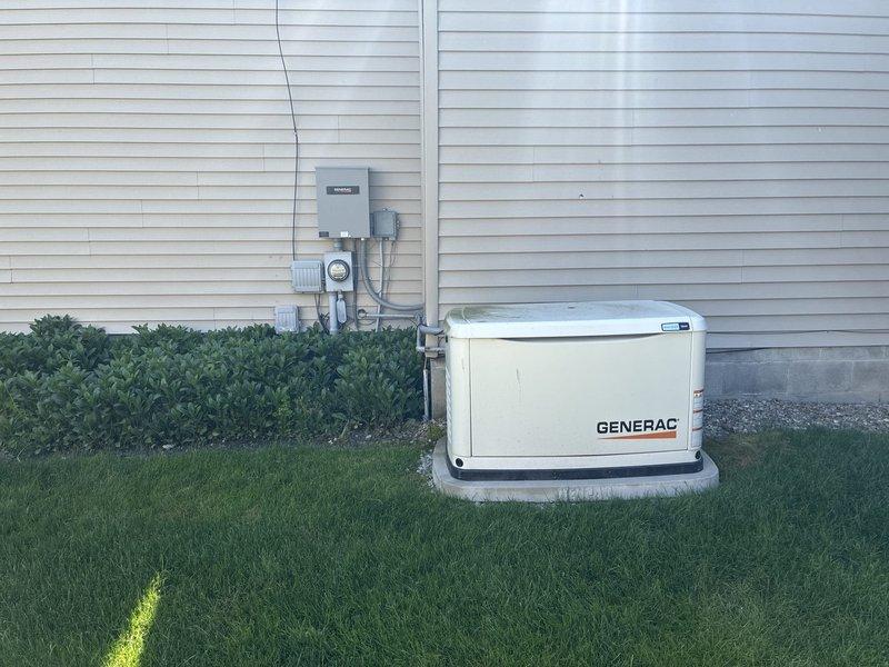 Completed annual preventive maintenance on residential Generac standby generator. Performed comprehensive system inspection including visual examination of unit exterior, transfer switch, and electrical connections. Conducted battery load test which revealed State of Health at 42% with 12.25V reading and 732A CCA against 550A standard—battery requires replacement due to degraded capacity. Inspected all conduit runs, mounting hardware, and concrete pad for proper installation. Verified generator control panel functionality and confirmed unit operational status. Recommended battery replacement at earliest convenience to ensure reliable emergency power operation.