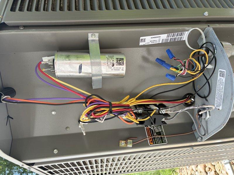 Completed MVP recurring cooling maintenance visit on residential HVAC system. Performed comprehensive inspection of unit interior, including blower wheel assembly and electrical components. Blower wheel showed clean condition with properly functioning centrifugal fan blades. Verified capacitor mounting and electrical connections, noting all wire terminations secure with appropriate color-coded wiring intact. All internal components operating within normal parameters with no issues identified during inspection.