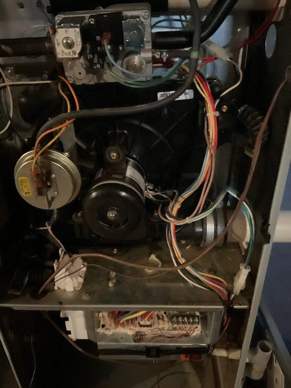 Responded to no-cooling complaint on 26-year-old air conditioning system. Upon inspection, found failed capacitor at outdoor unit with visible corrosion on electrical connections and mounting hardware. Replaced defective capacitor, cleaned electrical contacts, verified proper wire connections at contactor, and tested system operation. Unit restored to normal cooling function with all electrical components operating within specifications.