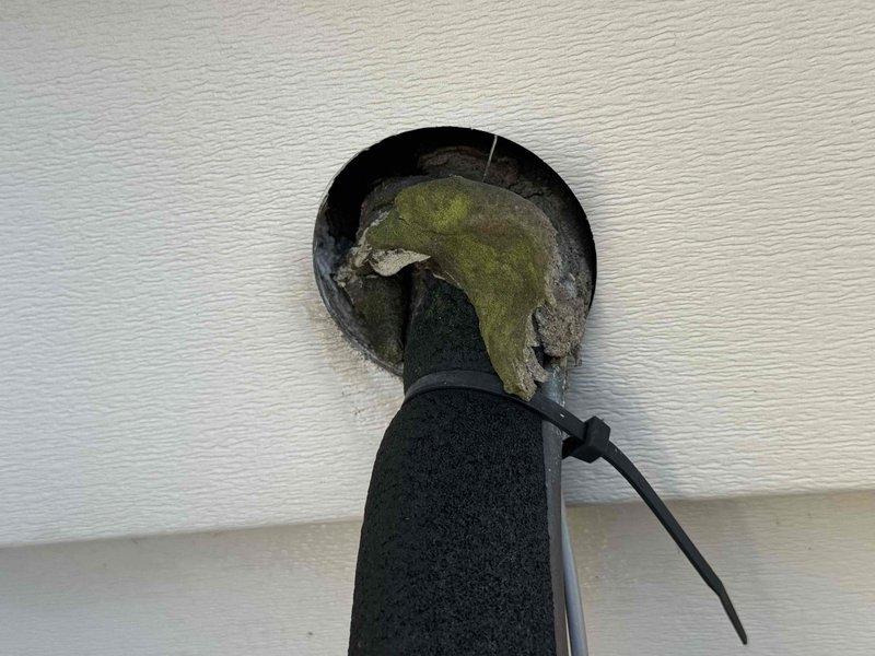Completed MVP cooling maintenance visit on system over 13 years old. Upon inspection, discovered significant mold contamination at supply duct penetration point in ceiling, with heavy green and yellowish growth on interior surfaces surrounding duct connection. Documented conditions with photos for customer records. Inspected outdoor condensing unit and verified all electrical components including dual-run capacitor, contactor relay, and wiring connections are functioning properly with secure installations and proper organization.