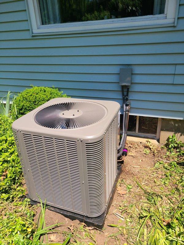Completed full HVAC system installation including 80% efficiency furnace and air conditioning unit. Installed outdoor AC condenser on pad beside residence with refrigerant lines and electrical conduit properly secured to exterior siding, and positioned indoor furnace unit in mechanical room with all necessary plumbing connections, ductwork, and venting completed per manufacturer specifications.