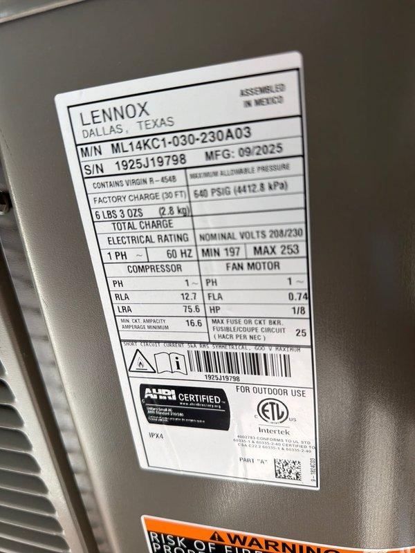 Completed installation of Lennox ML14KC1-030-230A03 air conditioning unit with matching evaporator coil as part of second-phase HVAC system installation. Unit manufactured September 2025, factory-charged with R-410A refrigerant at 540 PSIG for 50-foot line set. Installed 25-amp Littelfuse fuses in outdoor disconnect for proper electrical protection. Verified all electrical connections meet manufacturer specifications for 208/230V, single-phase, 60Hz operation. System commissioned and operational.