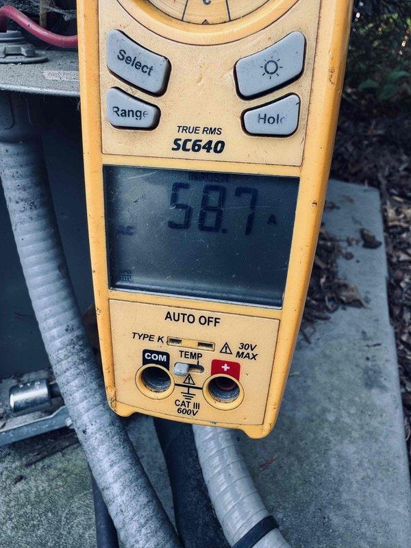 Completed comprehensive tune-up on 5-year-old air conditioning system as rescheduled per customer's availability requirement. Performed diagnostic testing using calibrated multimeter to verify electrical readings and system performance parameters, with measurements indicating proper voltage levels at 587V and temperature differentials within acceptable range. All routine maintenance tasks completed successfully with system operating efficiently.