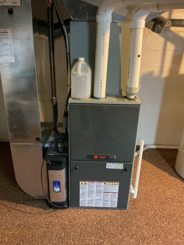 Completed yearly air conditioner maintenance on Trane HVAC system. Performed comprehensive inspection of indoor unit including filter check, blower assembly examination, condensate drain verification, and electrical connections testing. All components found operating within manufacturer specifications with no deficiencies noted.