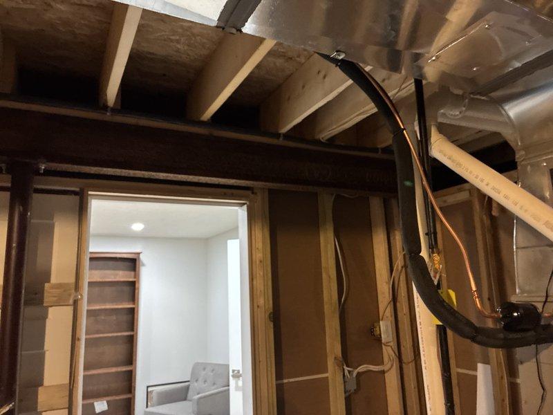 Completed installation of interior lighting fixtures and ceiling fan in finished living space. Ran new 220-volt dedicated circuit from main electrical panel through basement framing to exterior location for hot tub connection, ensuring proper wire gauge and conduit protection per NEC requirements. All electrical work tested and verified operational upon completion.