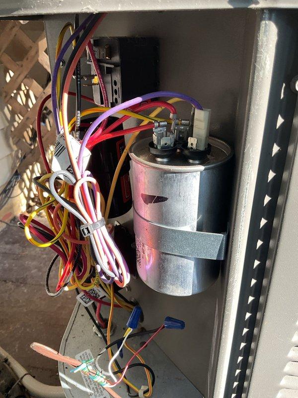 Completed MVP heating maintenance visit at customer's request. Performed comprehensive system inspection of outdoor condenser unit and electrical components. Inspected dual-run capacitor and verified all electrical connections were secure with proper wire management. Unit operating within normal parameters. Discussed MVP program details with customer as requested.