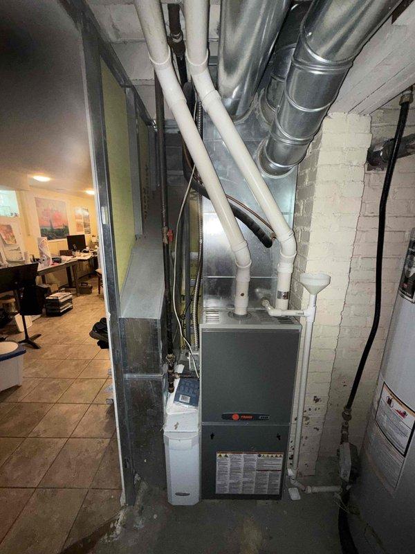 Completed scheduled MVP cooling maintenance visit on residential HVAC system. Performed comprehensive inspection of outdoor condensing unit, examining electrical components including capacitor, contactor, and associated wiring connections. Inspected indoor Trane furnace unit and verified proper operation of air handling equipment. All components found operating within normal parameters; system ready for continued cooling season operation.
