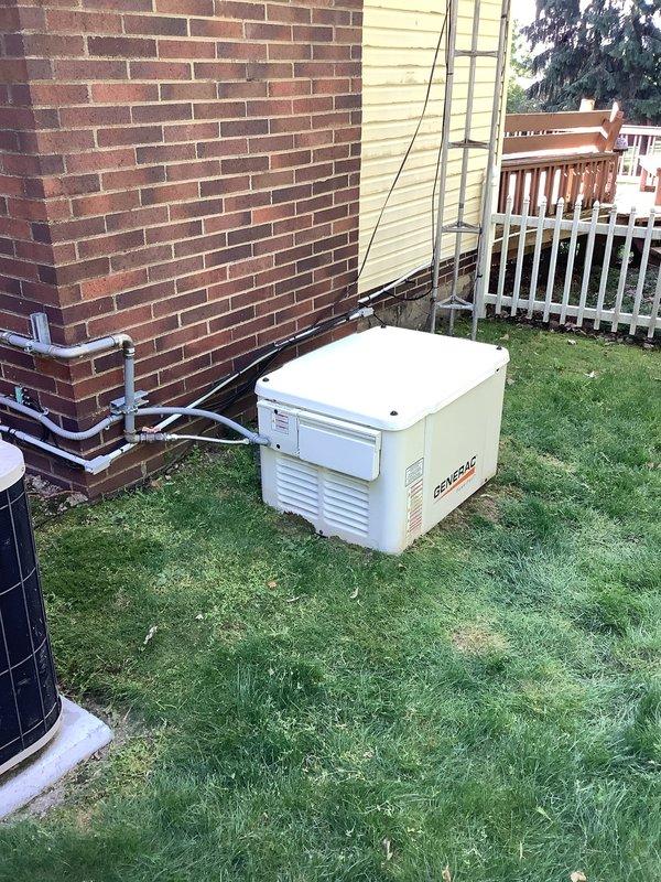 Performed scheduled maintenance on a 2-year-old Generac residential backup generator. Conducted comprehensive battery load test using digital analyzer, which confirmed battery in good operating condition with acceptable voltage and cranking capacity. Inspected generator unit, electrical connections, and conduit routing along exterior wall, verifying all components functioning properly with no issues identified.