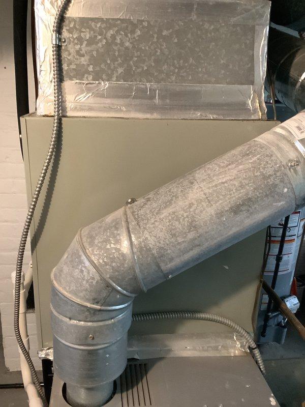 Completed HVAC system replacement for 14-year-old unit with refrigerant leak and no cooling condition. Installation included new air handler with ductwork modifications, proper insulation, and electrical connections in garage/utility space. System tested and operational upon completion.