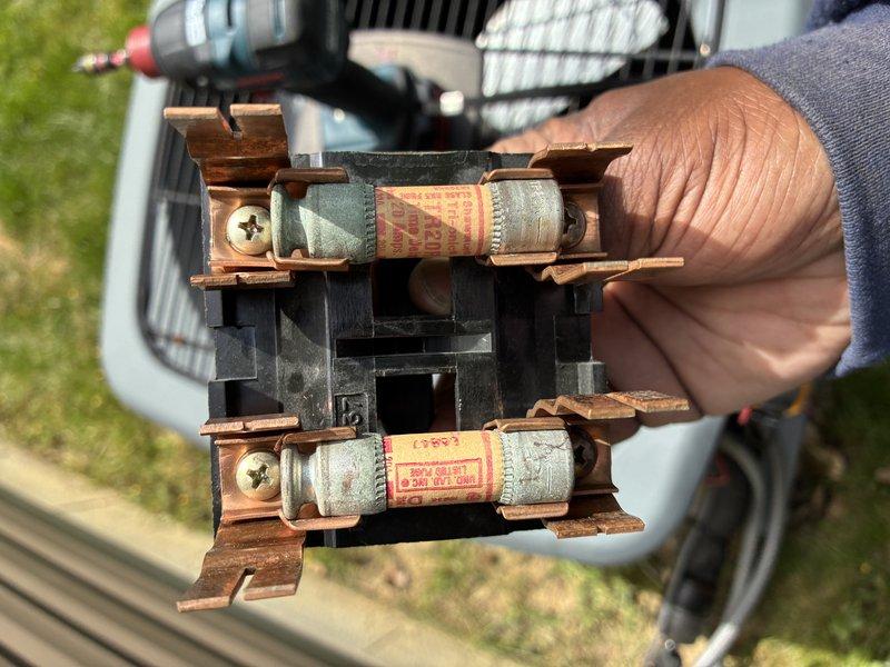 Completed MVP preventive maintenance visit on 7-year-old cooling system. Performed comprehensive system inspection including electrical testing with clamp meter to verify proper amperage draw and voltage levels at unit. Inspected and tested disconnect fuse assembly, noting moderate oxidation and corrosion on copper contacts and fuse holders consistent with outdoor exposure and system age. Verified both fuses intact and operational. Checked condenser coil condition, electrical connections, and overall system performance. All critical components tested and found functional. System operating within normal parameters for unit age.