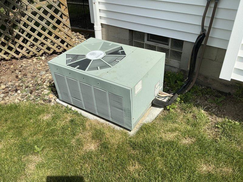 Completed comprehensive HVAC system evaluation for furnace and air conditioning replacement estimate under warranty claim. Assessed existing outdoor condensing unit condition, electrical disconnect configuration, and installation parameters including proper concrete pad placement, clearances, and service accessibility. Documented current system specifications and site conditions to prepare multiple replacement options as referenced in quotes 02763-04, 02763-06, and 02763-09.