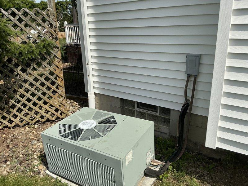 Completed comprehensive HVAC system evaluation for furnace and air conditioning replacement estimate under warranty claim. Assessed existing outdoor condensing unit condition, electrical disconnect configuration, and installation parameters including proper concrete pad placement, clearances, and service accessibility. Documented current system specifications and site conditions to prepare multiple replacement options as referenced in quotes 02763-04, 02763-06, and 02763-09.