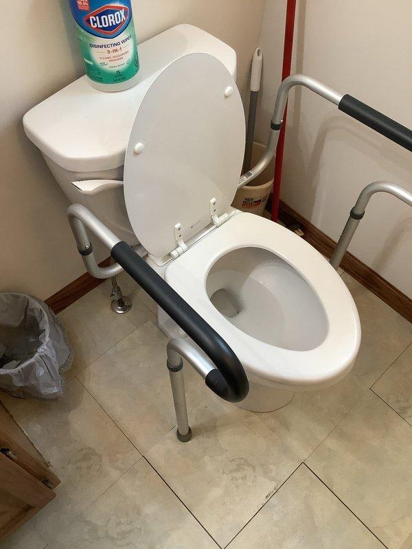 Responded to service call for water heater replacement estimate and water leak investigation. Assessed existing plumbing infrastructure in basement utility area, documenting aged copper piping system and mechanical components. Identified active water leak originating from ceiling, traced source to upstairs bathroom toilet with failed wax ring seal. Inspected bathroom toilet installation, confirmed deteriorated wax ring causing water infiltration through floor into basement below. Provided estimate for electric water heater replacement and recommended immediate toilet wax ring replacement to prevent further water damage to ceiling structure and building materials.