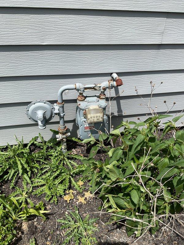 Responded to service call for inadequate hot water temperature throughout residence with 16-year-old tanked water heater. Upon inspection, diagnosed insufficient water heating capacity due to age-related deterioration of heating elements and sediment accumulation in tank. Given the unit's age exceeding typical 10-12 year lifespan and diminished performance, recommended replacement for optimal efficiency and reliability. Additionally, addressed secondary concern regarding loose toilet fixture in bathroom. Inspected toilet mounting and found compromised wax ring seal and loose closet bolts. Secured toilet to floor flange by tightening mounting hardware and verified proper seating to prevent future movement and potential leak issues. Provided homeowner with assessment of water heater condition and replacement options to restore full hot water capacity to the home.