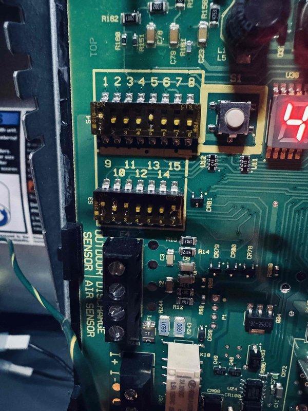 Completed preventive maintenance inspection on air conditioning system control board and electrical components. Documented condition of PCB with integrated circuits, sensors, LED display indicators, and wire harness connections. All electronic components, terminals, and copper coil inductors found in proper working order with no visible signs of wear or damage requiring immediate attention.