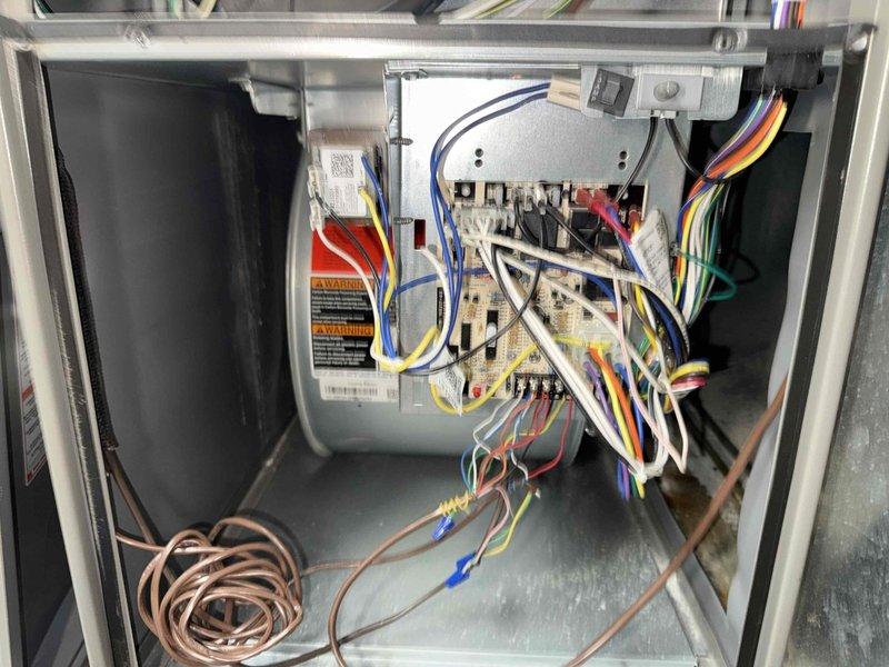 Completed MVP cooling maintenance visit on HVAC system. Performed comprehensive inspection of blower assembly and squirrel cage fan wheel, verifying proper fin alignment and structural integrity. Accessed electrical control compartment and inspected all wiring connections, control board, safety switches, and sensor components to ensure system operating within manufacturer specifications.