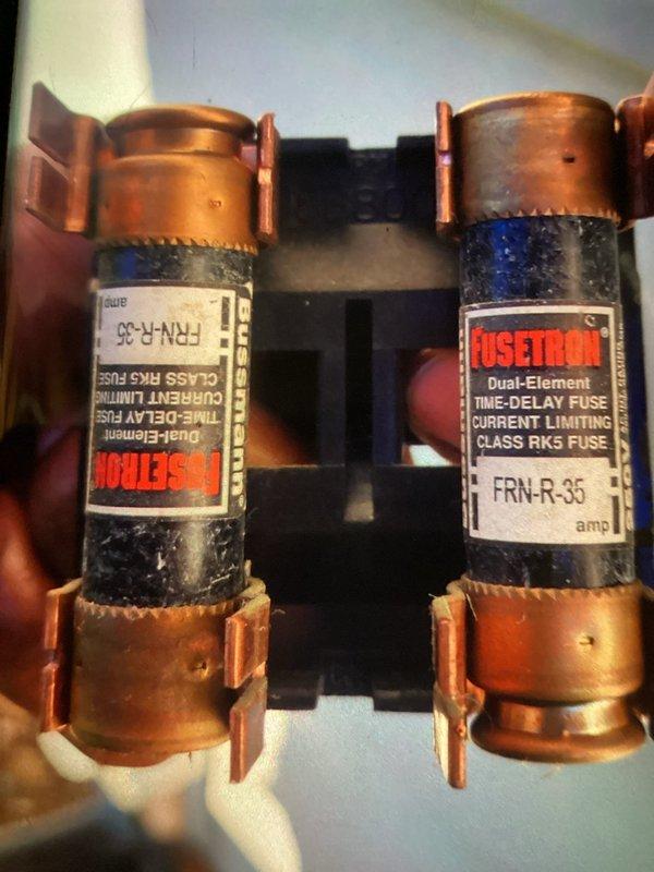 Completed preventive maintenance inspection on air conditioning system for MVP customer. Inspected electrical components including dual-element time-delay fuses (FRN-R-35, 35 amp, Class RK5 current limiting) and evaporator coil assembly. All components found in operational condition with normal wear patterns consistent with system age.