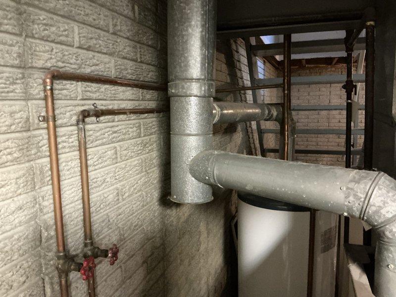 Conducted estimate for furnace replacement on aging system over 40 years old. Assessed existing HVAC equipment and ductwork in mechanical room, noting deteriorated condition of blower motor assembly. Provided quote for complete blower motor replacement with documentation of current system configuration including metal ductwork, copper piping, and ventilation components.