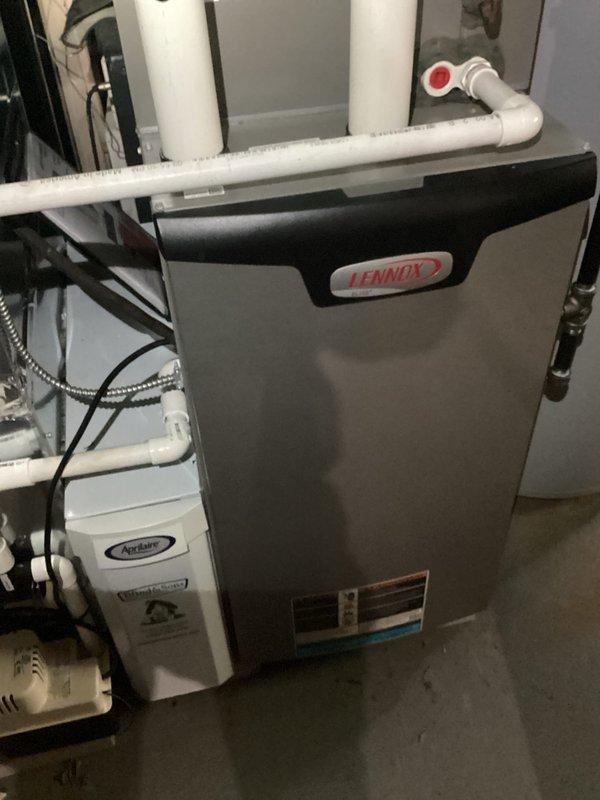 Completed early season AC tune-up on Lennox system, including comprehensive inspection of indoor air handler and outdoor condensing unit. Performed filter replacement, verified condensate pump operation in drain pan assembly, checked refrigerant levels, cleaned components, and confirmed all electrical connections and safety controls were functioning properly.