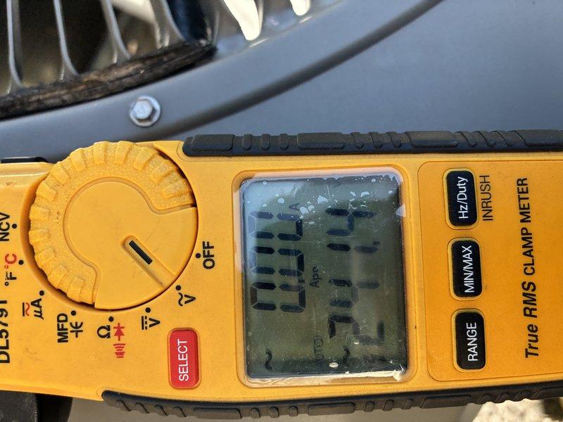 Completed MVP cooling maintenance visit on 4-year-old HVAC system. Inspected and tested electrical components, including 250V AC fuses rated at TF600K. Measured system amperage at 213.3 amps using clamp meter to verify proper electrical draw and compressor performance. Verified condenser unit operation and inspected finned coil for proper heat transfer. All electrical connections tested and found secure. System operating within normal parameters.