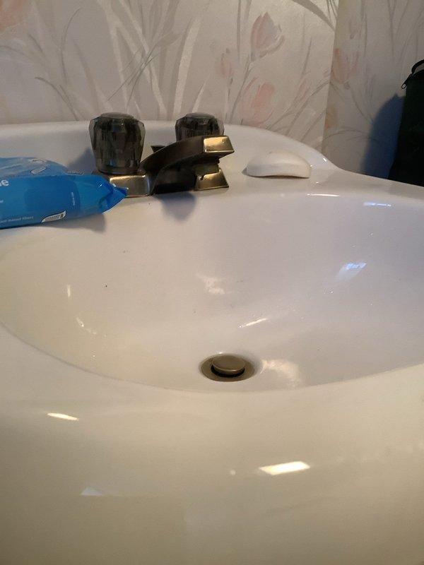 Responded to service call for multiple plumbing leaks in residential property. Addressed leaking plastic piping at kitchen sink and repaired wall line requiring seal in basement bathroom. Inspected plumbing fixtures including shutoff valves, PVC connections, and pipe mounting hardware to ensure proper function and prevent future water damage.